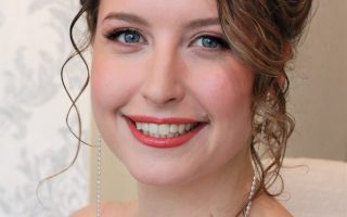 Bridal makeup and hairstyling with natural curls